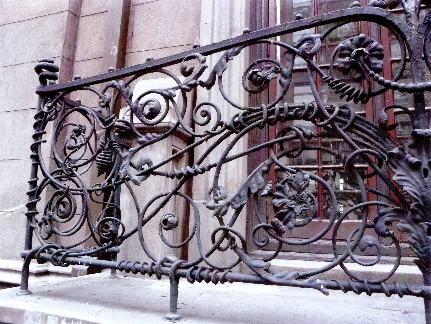 Iron door with scrollwork